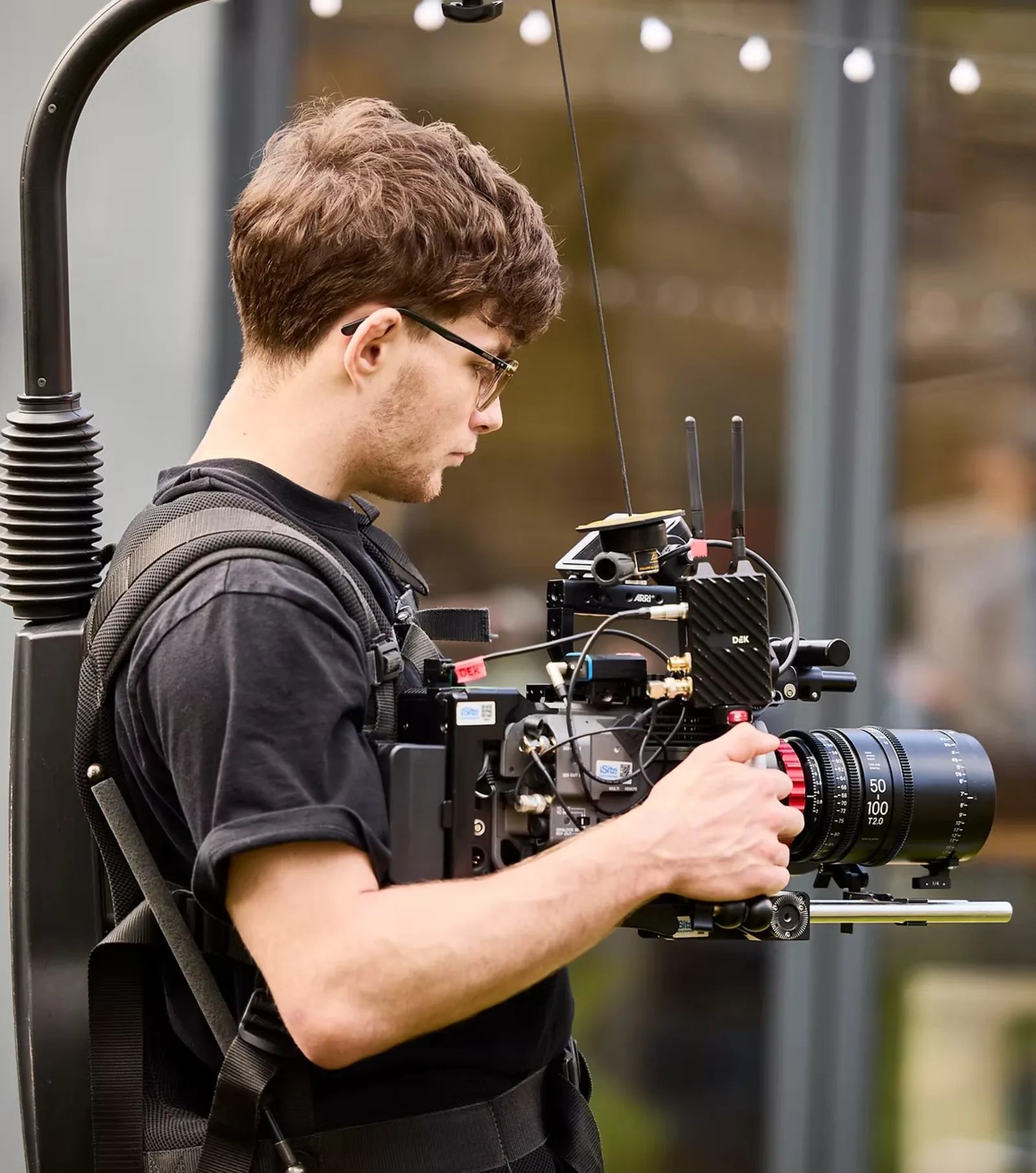 Leon Brinkley with camera rig and support harness on location